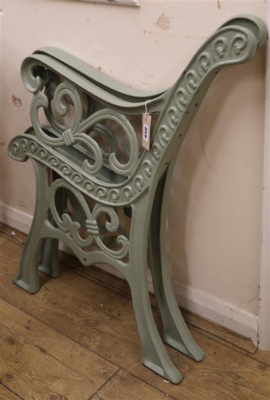 A pair of cast iron bench ends W.65cm